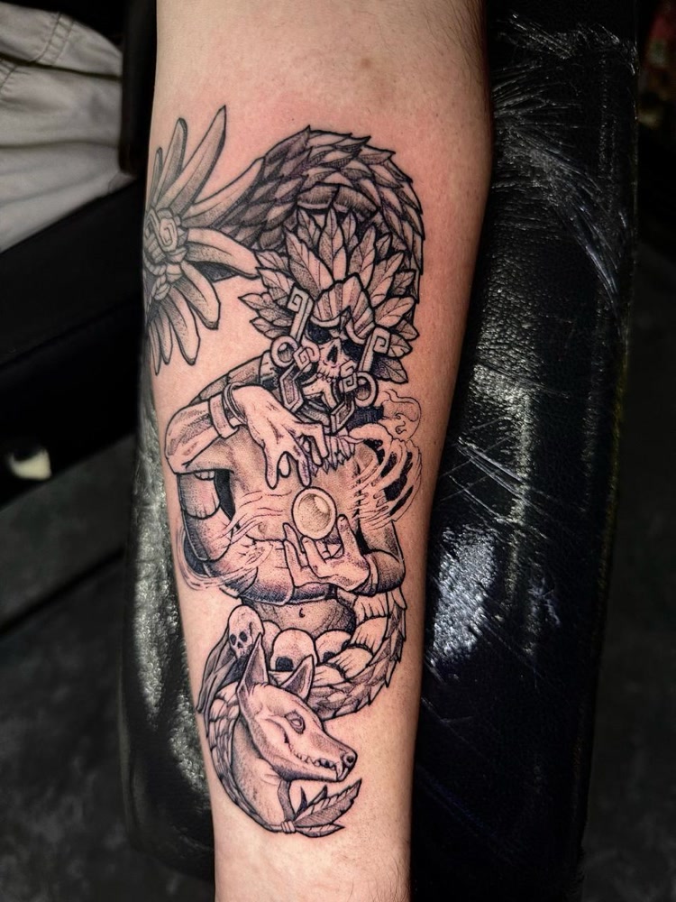 Aztec warrior with feathered headdress and wolf