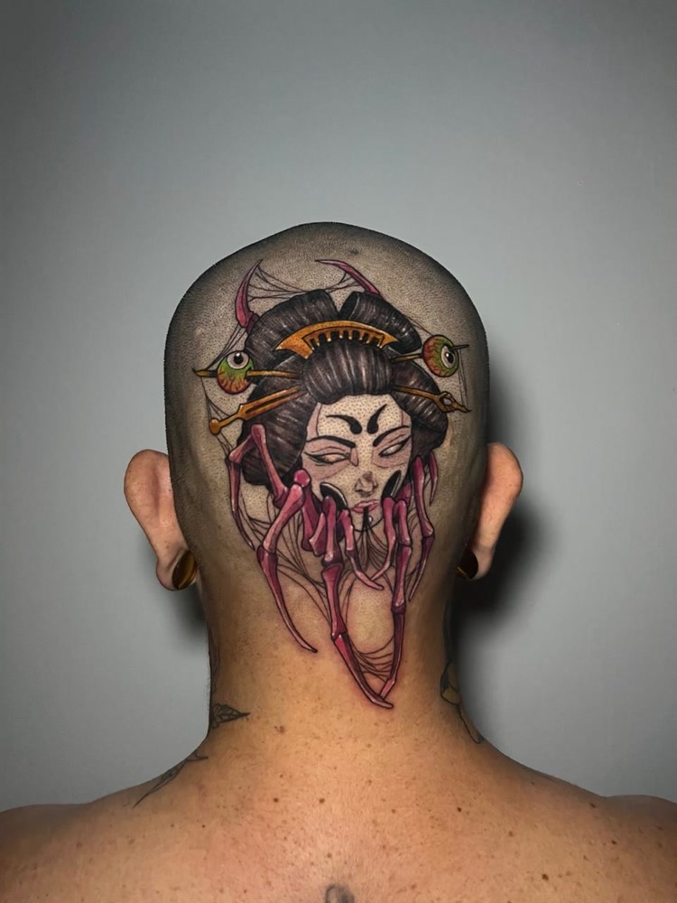 Neo-traditional geisha head tattoo with skeleton hands