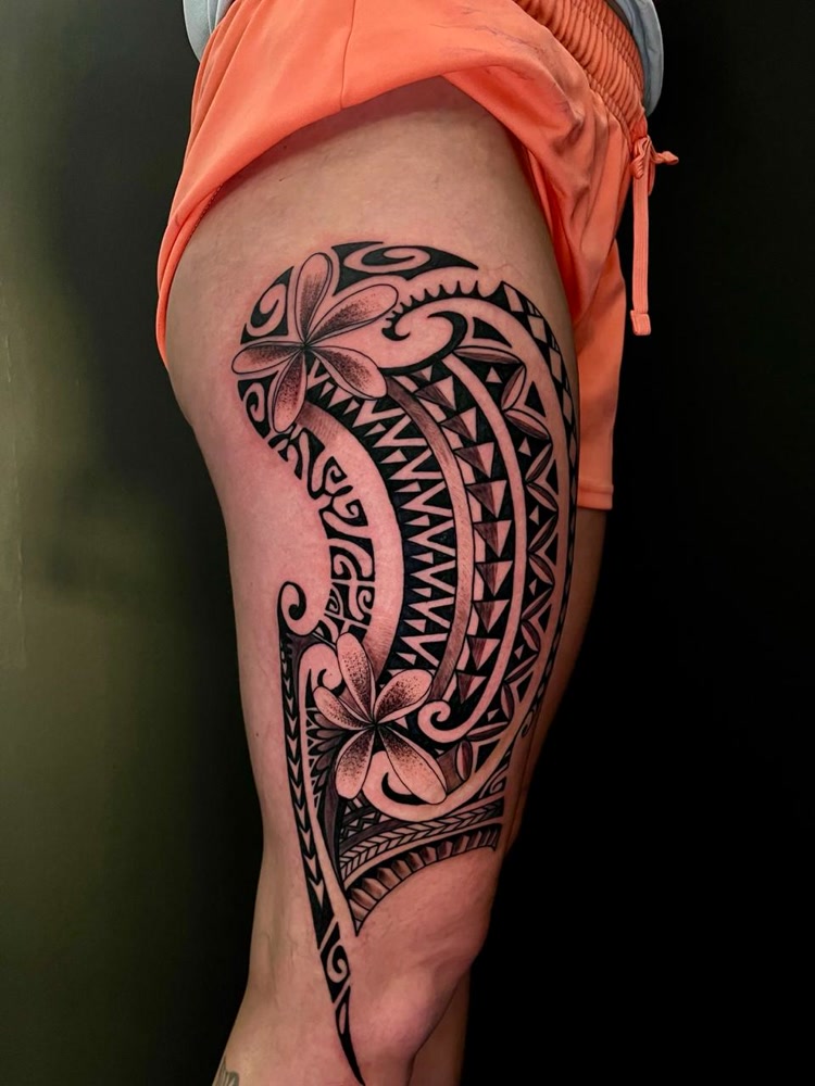 Maori tribal thigh piece with plumeria flowers