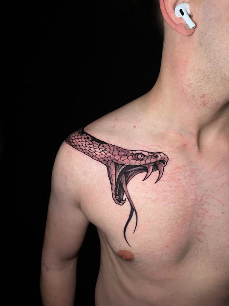 Snake shoulder to chest blackwork