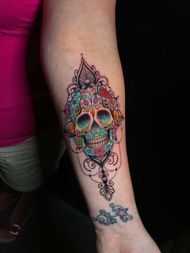 Colorful sugar skull with ornamental frame