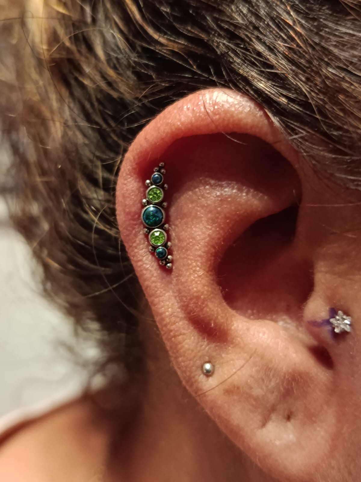 Industrial piercing with gemstones