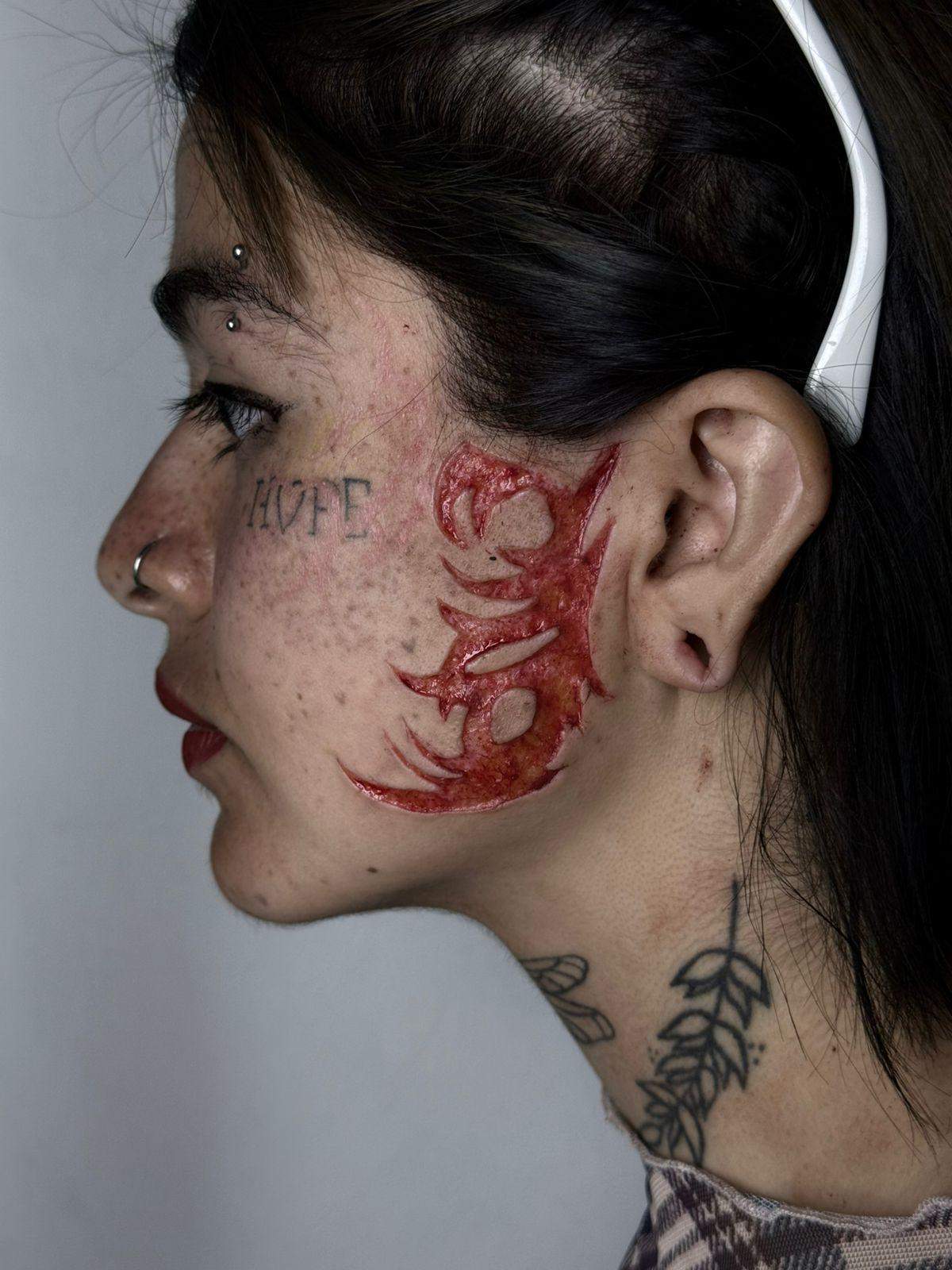 Facial scarification body modification